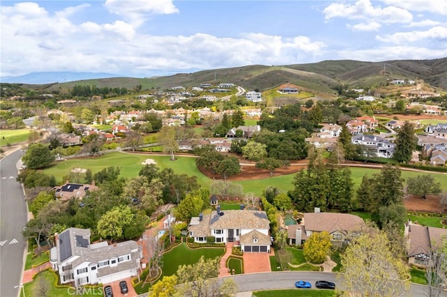 bird's eye view featuring a mountain view, a residential view, and golf course view