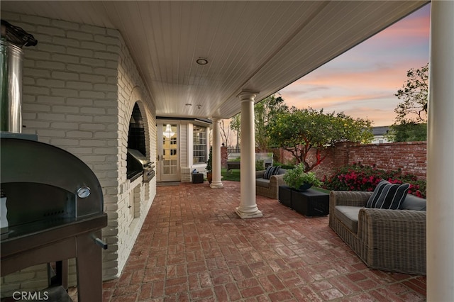 view of patio / terrace featuring grilling area and fence