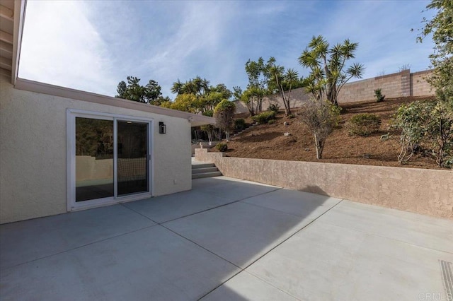 view of patio / terrace with fence