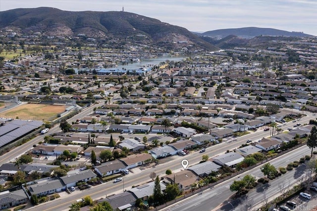 bird's eye view featuring a residential view and a mountain view