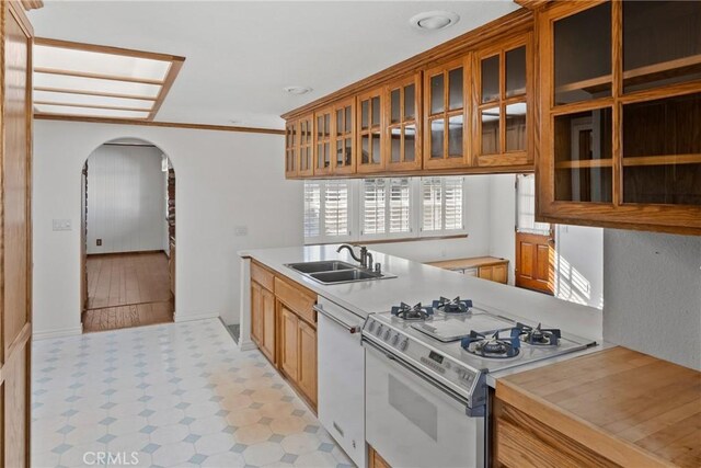 kitchen with sink and white appliances