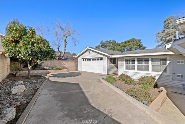 ranch-style house featuring a garage