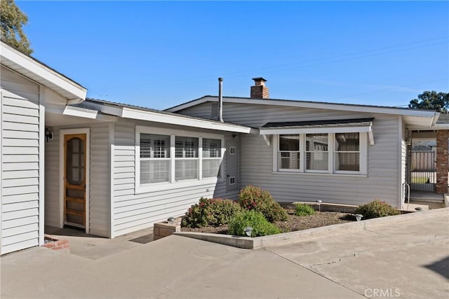 view of front of home featuring a patio