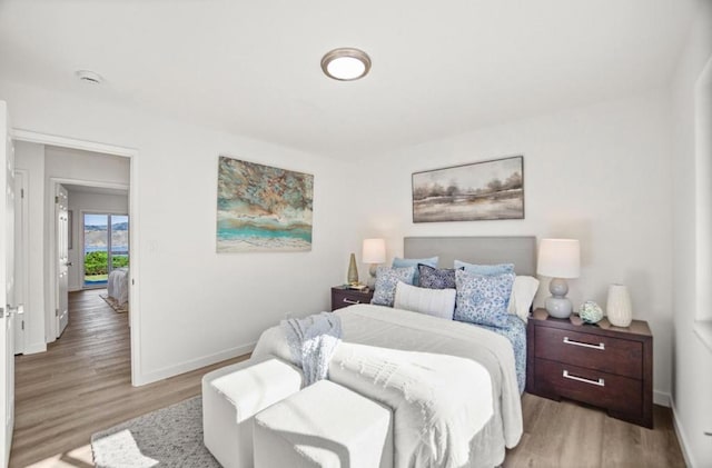 bedroom featuring light wood-type flooring