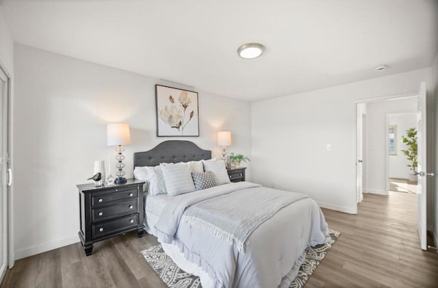 bedroom featuring hardwood / wood-style floors