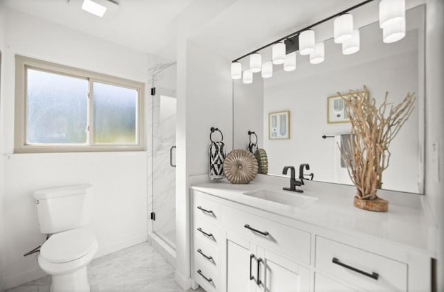 bathroom featuring vanity, an enclosed shower, and toilet