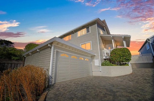 view of front of property with a garage