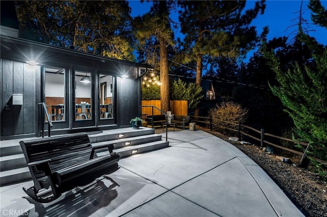 view of patio at twilight