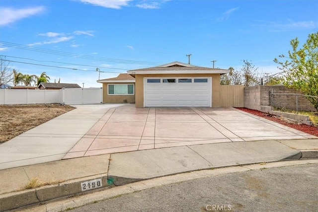 single story home featuring a garage