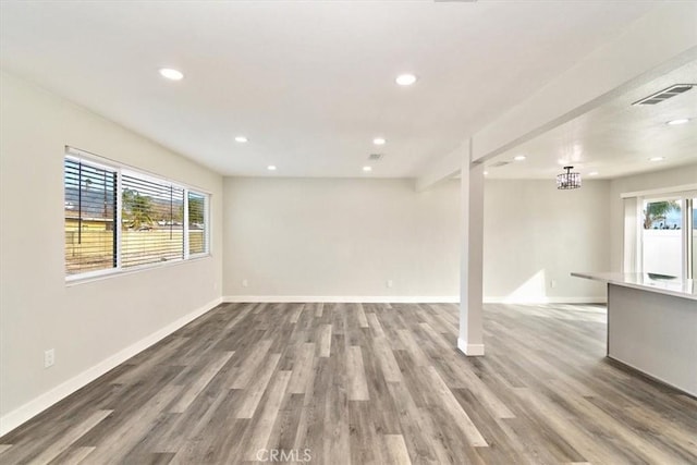 basement featuring wood-type flooring