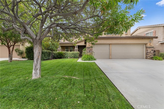 view of front of home with a garage and a front yard