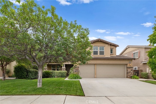 view of front of property featuring a garage and a front yard