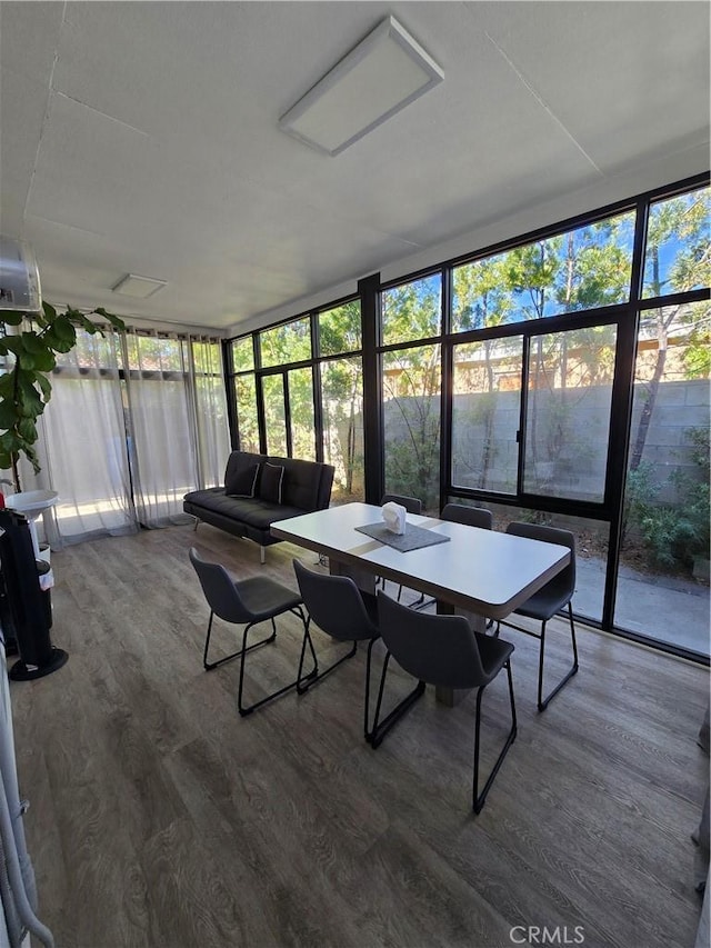 sunroom / solarium with a healthy amount of sunlight