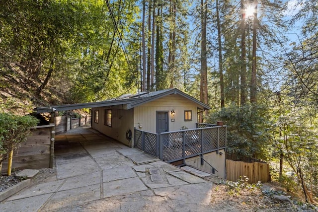 view of front of property with a carport