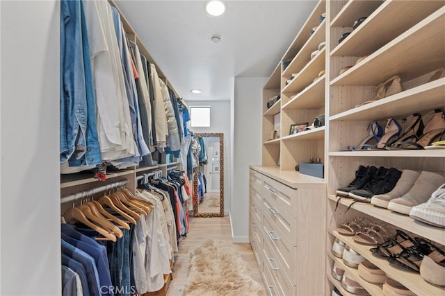 walk in closet featuring light wood-type flooring