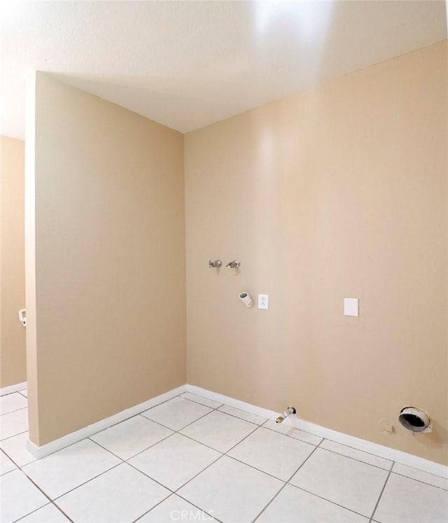 laundry room with hookup for a washing machine, light tile patterned flooring, and hookup for a gas dryer