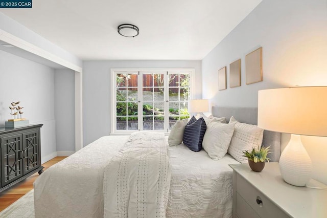 bedroom featuring light hardwood / wood-style flooring