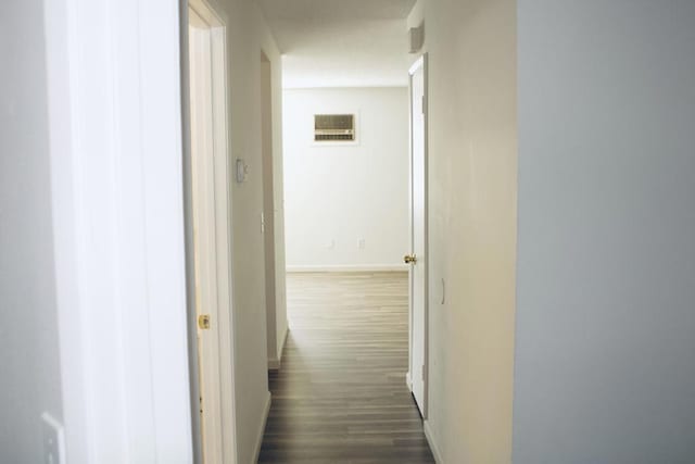 hall with dark hardwood / wood-style floors