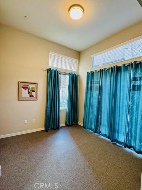 view of carpeted spare room