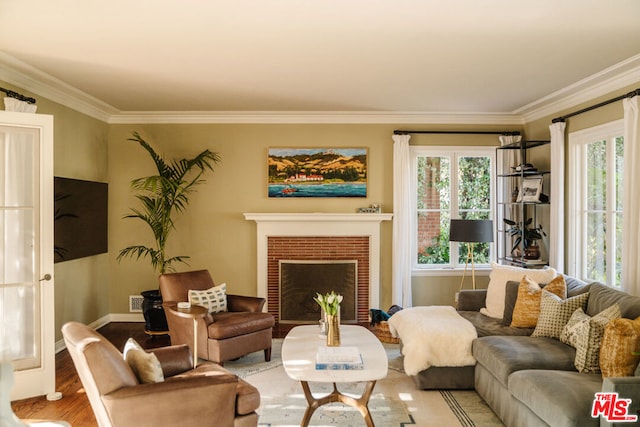 living room with hardwood / wood-style flooring and ornamental molding