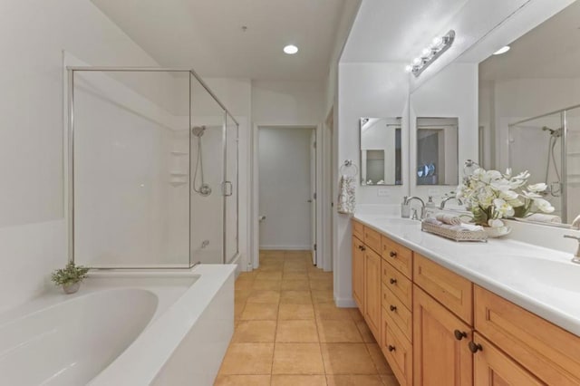 bathroom with vanity, tile patterned floors, and independent shower and bath