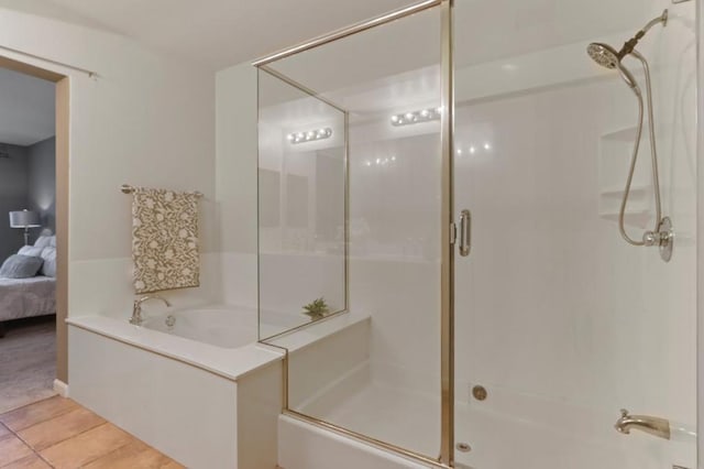 bathroom featuring tile patterned flooring and plus walk in shower