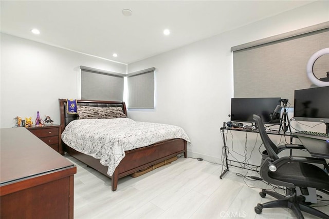 bedroom with light wood-type flooring