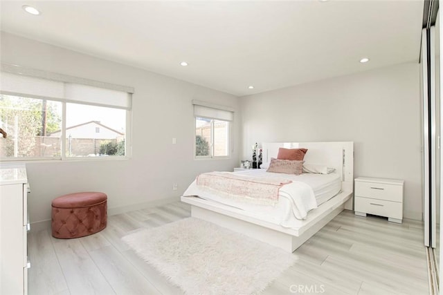 bedroom featuring light wood-type flooring