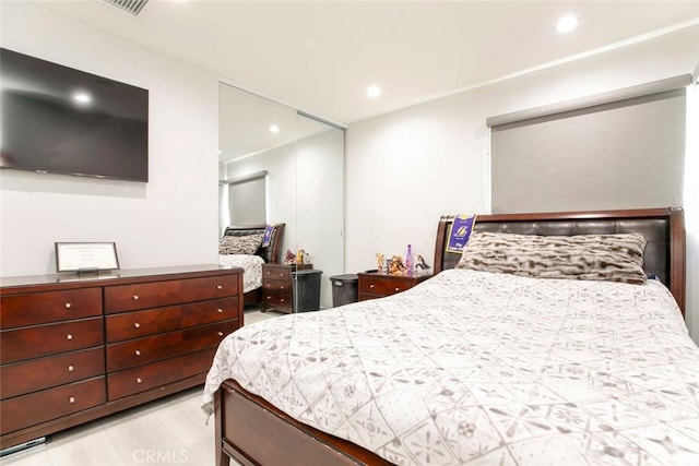 bedroom featuring light wood-type flooring