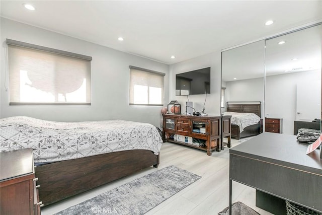 bedroom with light hardwood / wood-style flooring