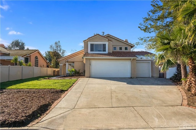 view of front of home with a garage and a front lawn