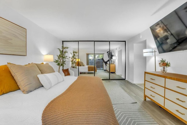 bedroom featuring light wood-type flooring