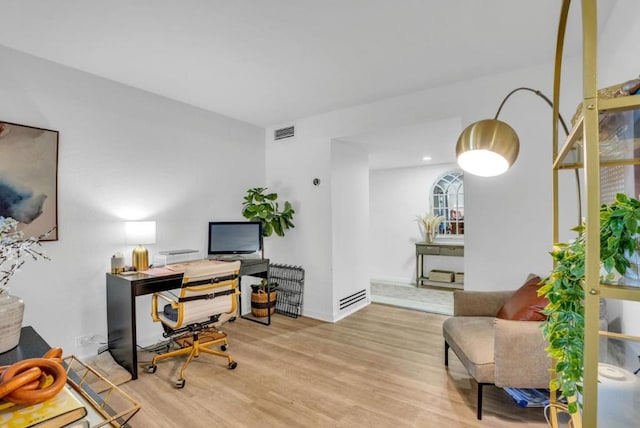 office featuring light hardwood / wood-style flooring