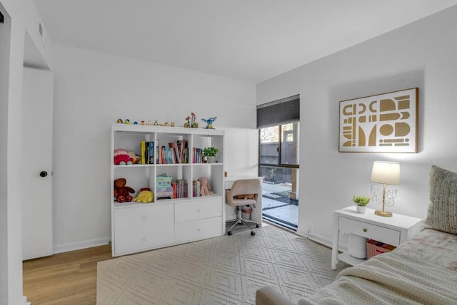 bedroom featuring light hardwood / wood-style floors