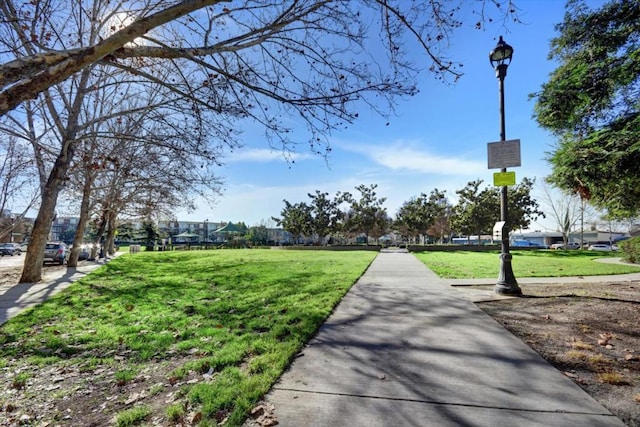 surrounding community featuring a lawn