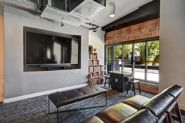 carpeted living room with vaulted ceiling