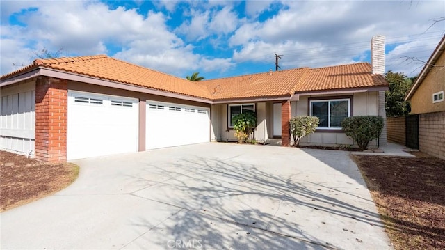 ranch-style home with a garage