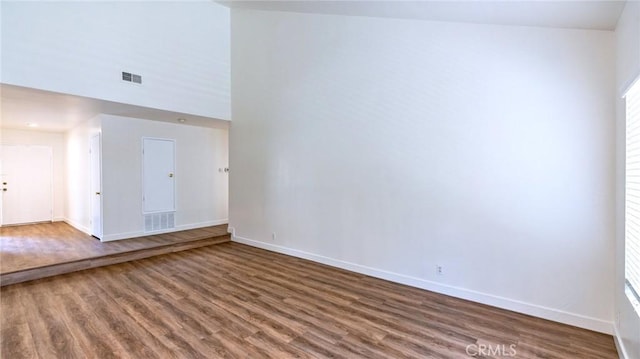 spare room featuring dark hardwood / wood-style floors