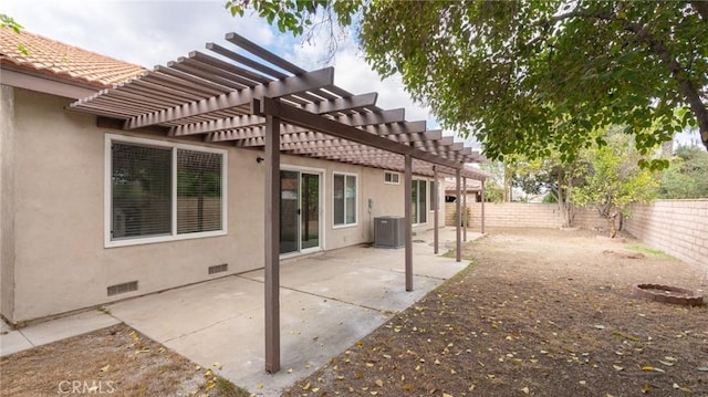 view of patio with central AC unit and a pergola