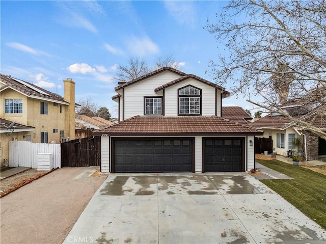 front of property with a garage