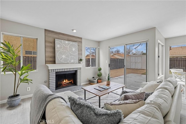 living room featuring hardwood / wood-style floors and a fireplace