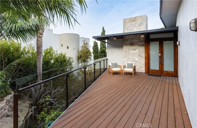 wooden terrace featuring french doors