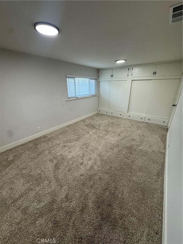 interior space featuring visible vents and baseboards