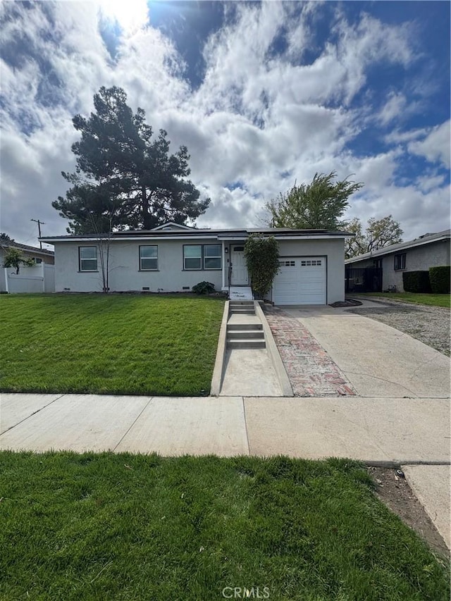 single story home featuring concrete driveway, an attached garage, a front lawn, and stucco siding