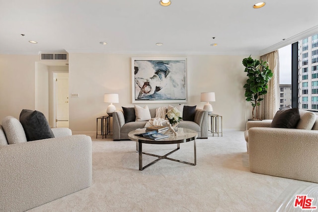 carpeted living room featuring crown molding