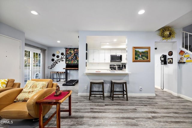 living room featuring light wood-type flooring