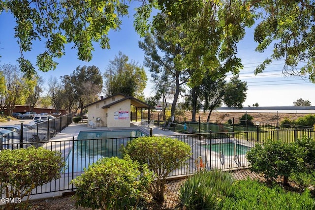 view of swimming pool featuring a patio