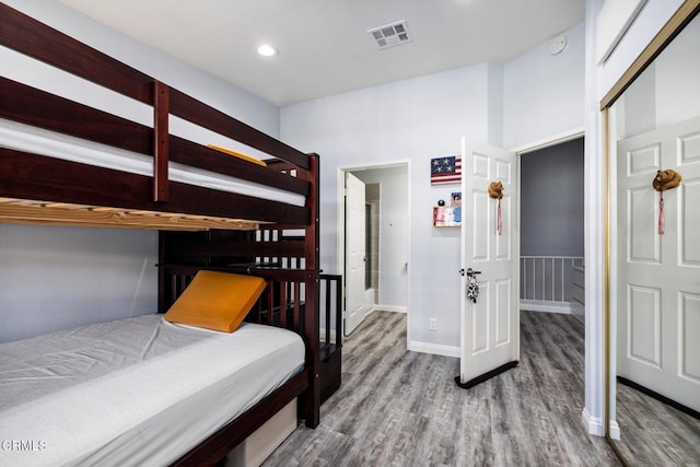 bedroom featuring wood-type flooring