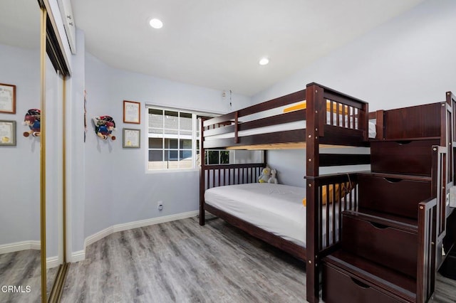 bedroom with light wood-type flooring