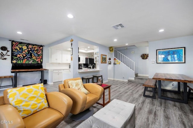 11300 Foothill Blvd Unit 72, Sylmar, CA 91342 - living area with recessed lighting, light wood finished floors, and stairway